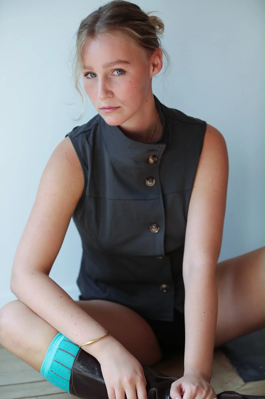 Charlotte Damman in a charcoal top, colour headshot